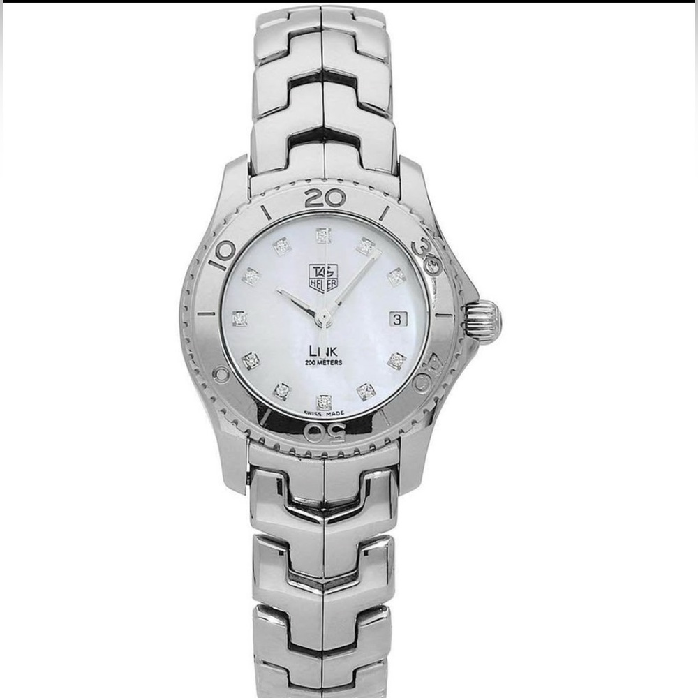 TAG Heuer, waterproof 200ft, Mother of Pearl, Diamond hour markers.